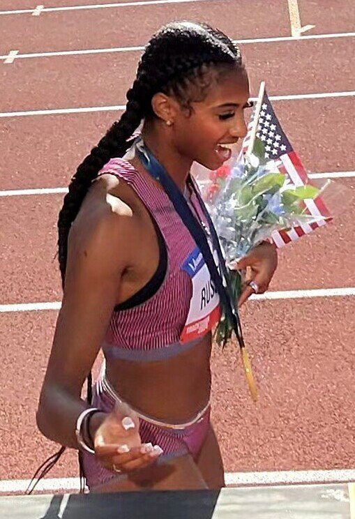 Masai Russell: American Track and Field Hurdler photo