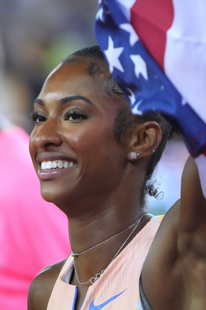 Masai Russell: American Track and Field Hurdler photo